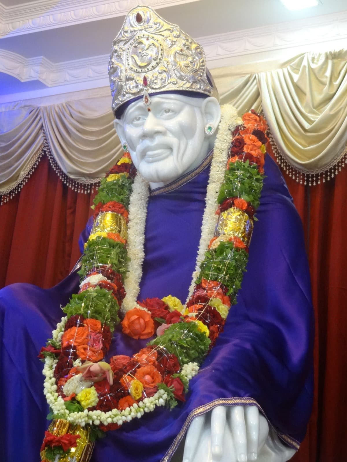 Sacred darshan of Sai Baba at the Ashram